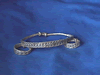 silver bracelet and rings