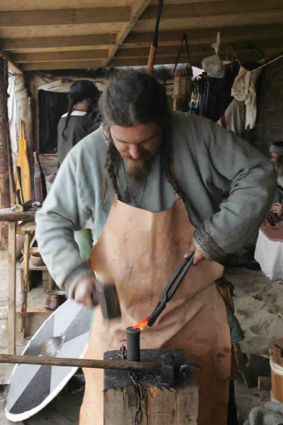 Cathbad hammering out a spearhead